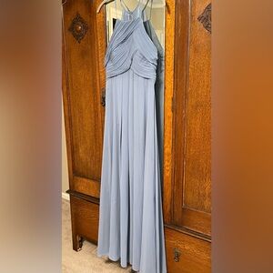 Soft blue halter style formal with pleated bodice and flowing skirt. Size 2